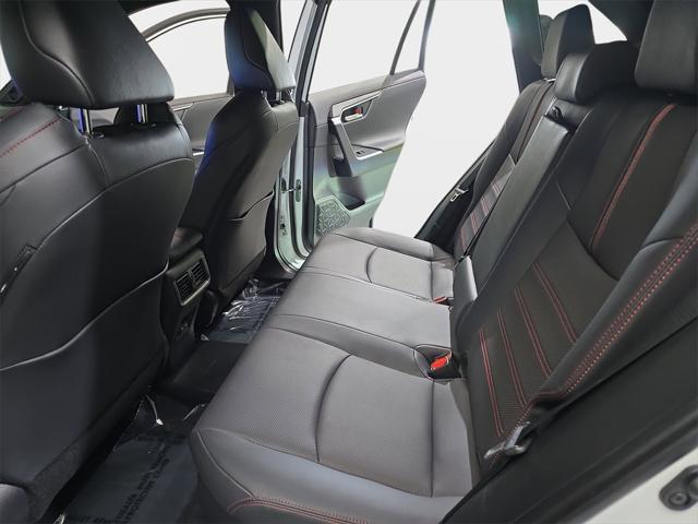 Photo of 2025 Wind Chill Pearl/Midnight Black Metallic Toyota RAV4 Hybrid