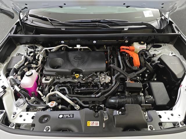 Photo of 2025 Wind Chill Pearl/Midnight Black Metallic Toyota RAV4 Hybrid