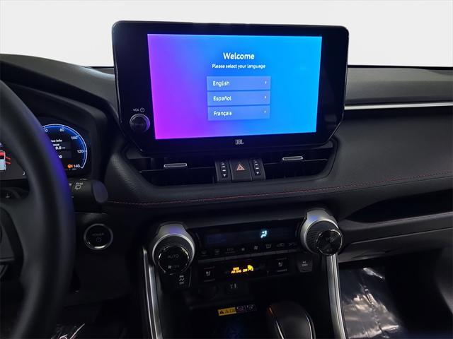 Photo of 2025 Wind Chill Pearl/Midnight Black Metallic Toyota RAV4 Hybrid