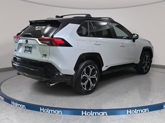 Photo of 2025 Wind Chill Pearl/Midnight Black Metallic Toyota RAV4 Hybrid