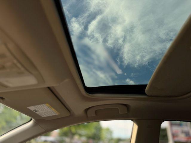 Photo of 2011 Black Amethyst Nissan Rogue