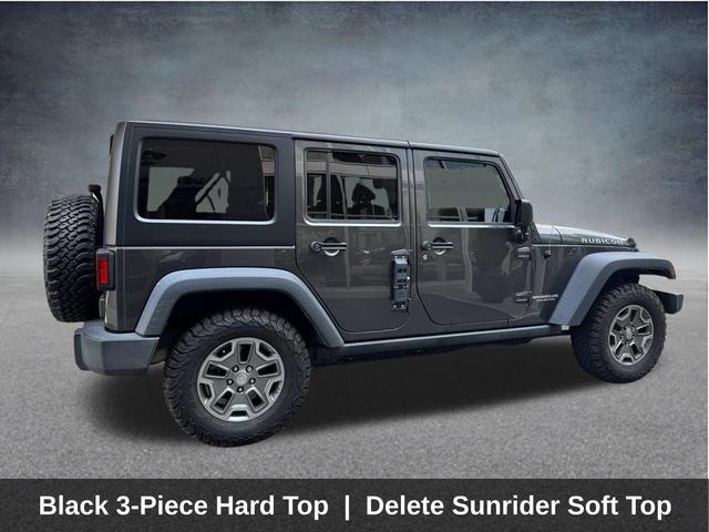 Photo of 2017 Granite Crystal Clearcoat Metallic Jeep Wrangler Unlimited