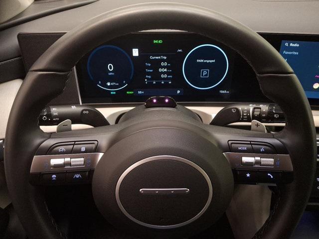 Photo of 2025 Titan Gray Hyundai TUCSON Hybrid