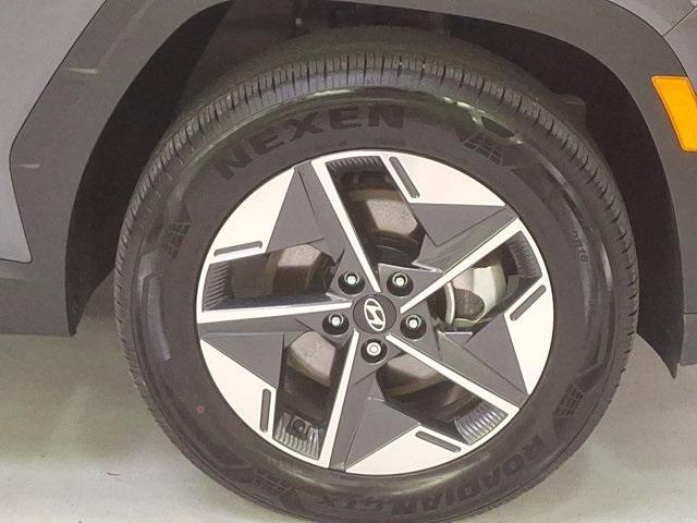 Photo of 2025 Titan Gray Hyundai TUCSON Hybrid