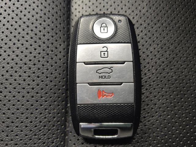 Photo of 2017 Currant Red Kia Forte
