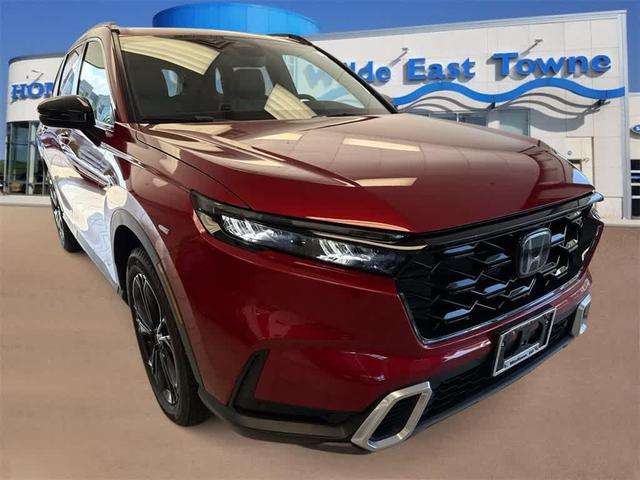 Photo of 2024 Radiant Red Metallic Honda CR-V Hybrid