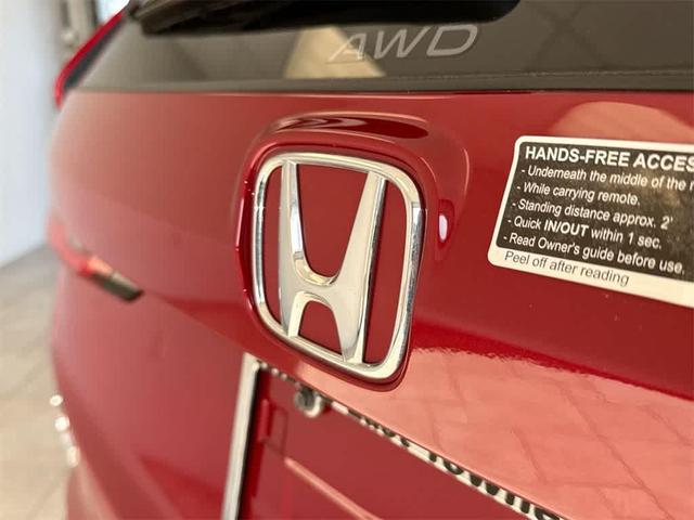 Photo of 2024 Radiant Red Metallic Honda CR-V Hybrid