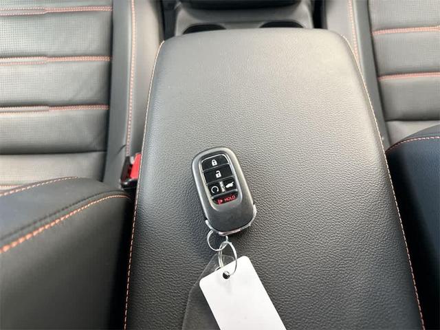 Photo of 2024 Radiant Red Metallic Honda CR-V Hybrid