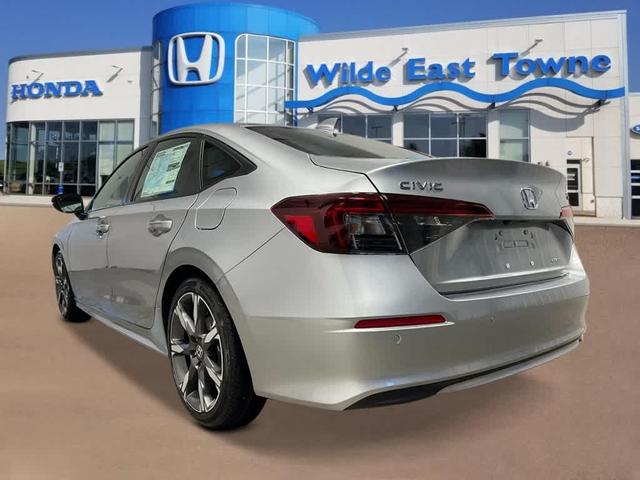 Photo of 2026 Solar Silver Metallic Honda Civic Hybrid