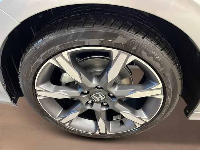 Photo of 2026 Solar Silver Metallic Honda Civic Hybrid