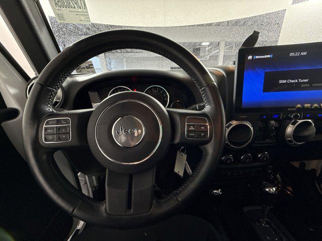 Photo of 2015 Bright White Clearcoat Jeep Wrangler Unlimited