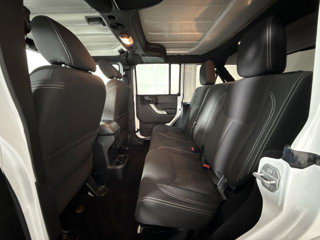 Photo of 2015 Bright White Clearcoat Jeep Wrangler Unlimited