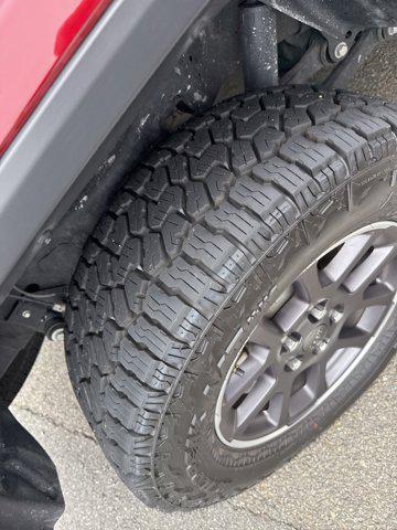 Photo of 2021 Snazzberry Pearlcoat Jeep Gladiator