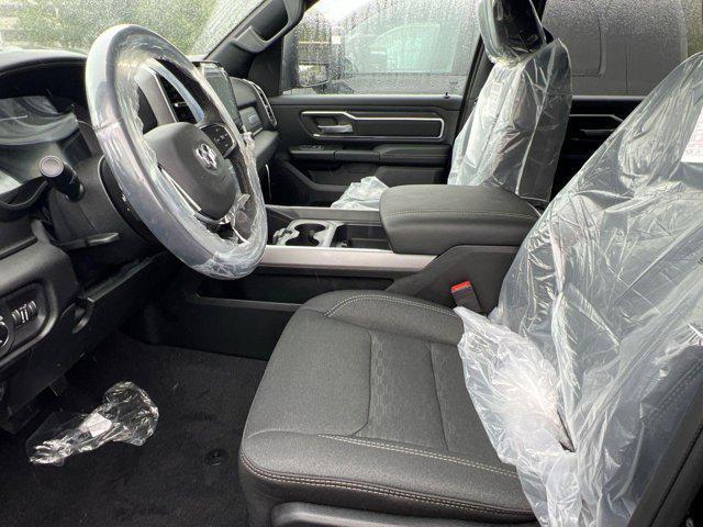 Photo of 2025 Diamond Black Crystal Pearlcoat RAM 1500