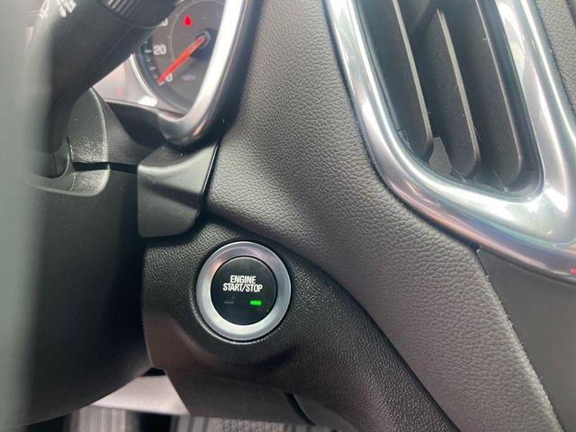 Photo of 2024 Radiant Red Tintcoat Chevrolet Equinox