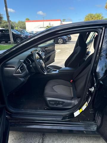 Photo of 2024 Midnight Black Metallic Toyota Camry