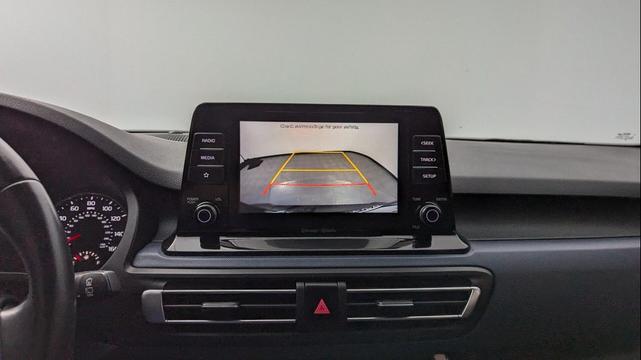 Photo of 2021 Cherry Black Kia Seltos