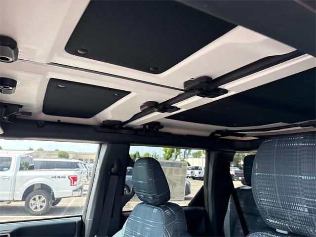 Photo of 2025 Ruby Red Metallic Tinted Clearcoat Ford Bronco
