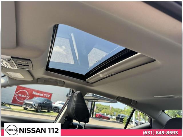 Photo of 2025 Garnet Pearl Metallic Nissan Altima