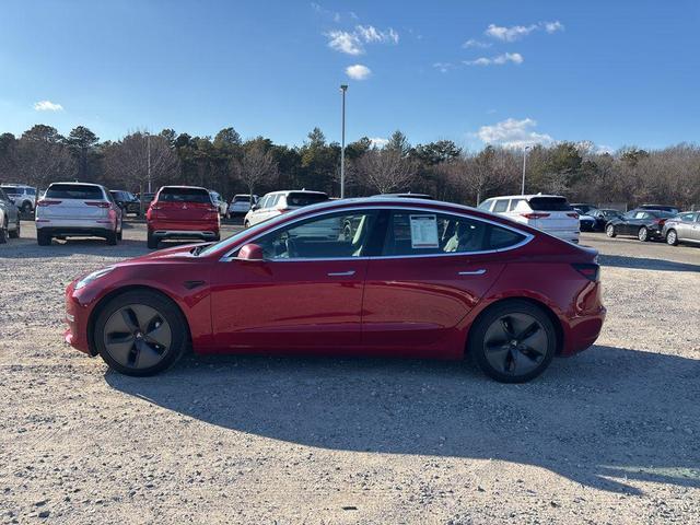 Photo of 2018 Red Multi-Coat Tesla Model 3