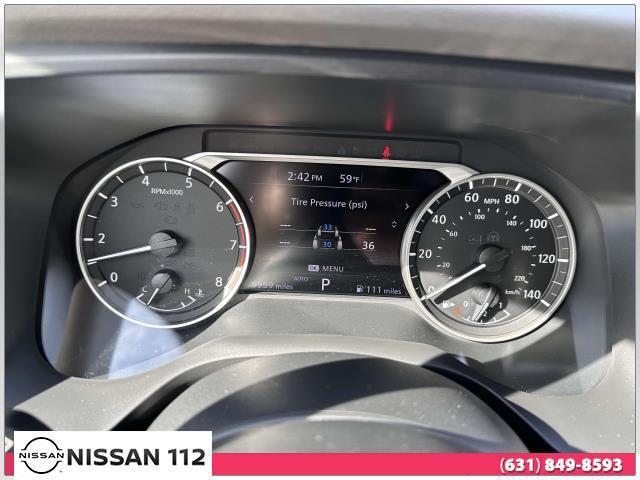Photo of 2023 Pearl White Tricoat Nissan Rogue