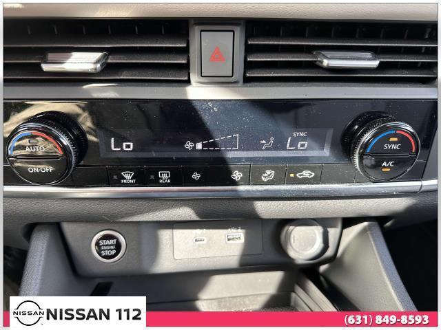 Photo of 2023 Pearl White Tricoat Nissan Rogue
