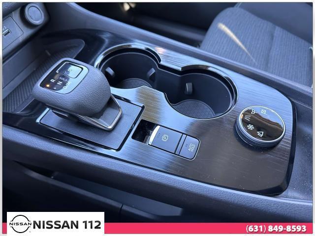 Photo of 2023 Scarlet Ember Tintcoat Nissan Rogue