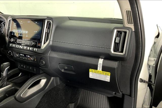 Photo of 2025 Glacier White Nissan Frontier