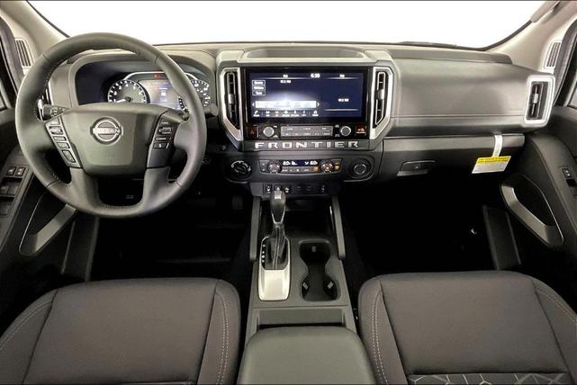 Photo of 2025 Glacier White Nissan Frontier