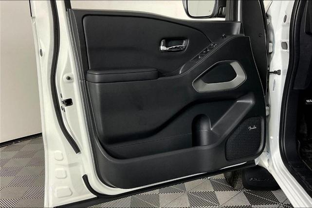 Photo of 2025 Glacier White Nissan Frontier