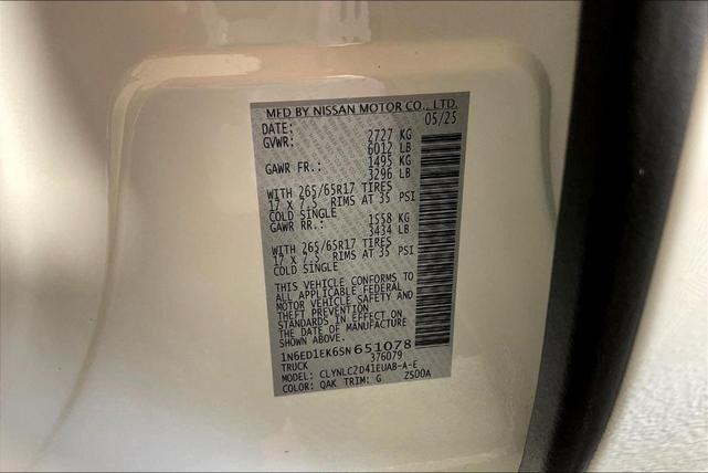 Photo of 2025 Glacier White Nissan Frontier