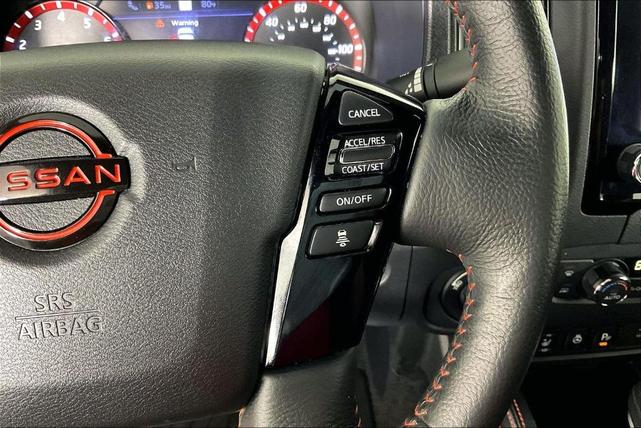 Photo of 2023 Glacier White Nissan Frontier