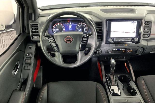 Photo of 2023 Glacier White Nissan Frontier