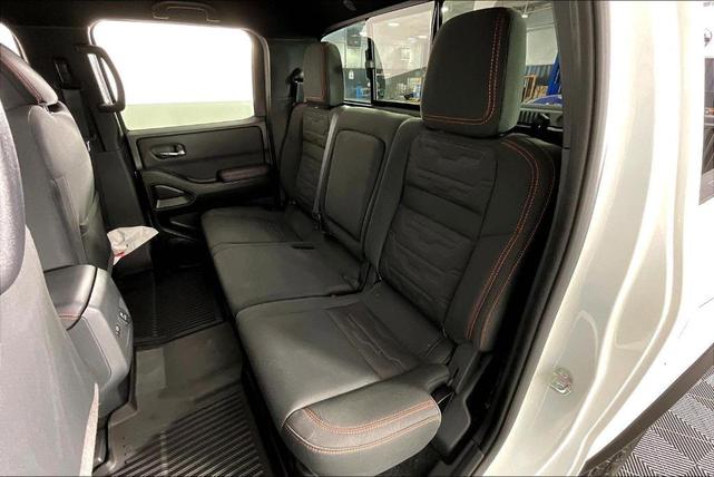 Photo of 2023 Glacier White Nissan Frontier