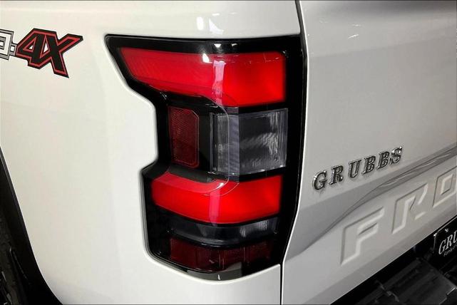 Photo of 2023 Glacier White Nissan Frontier