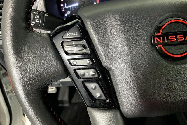 Photo of 2023 Glacier White Nissan Frontier