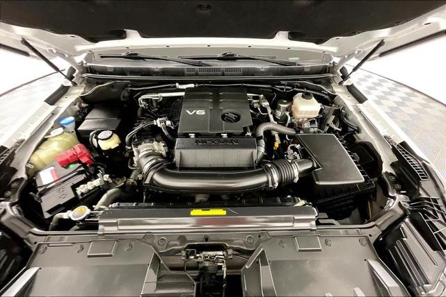 Photo of 2023 Glacier White Nissan Frontier