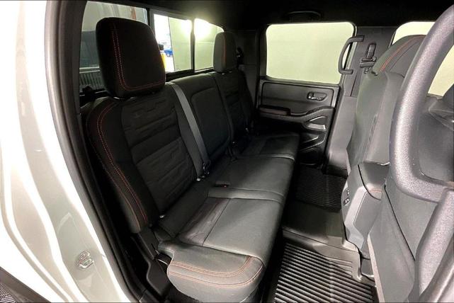 Photo of 2023 Glacier White Nissan Frontier