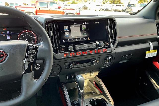 Photo of 2025 Glacier White Nissan Frontier