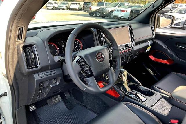Photo of 2025 Glacier White Nissan Frontier