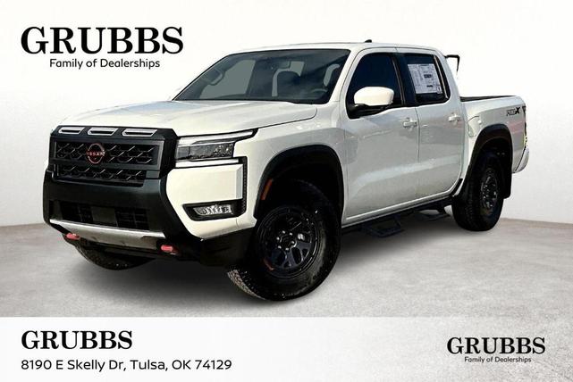 Photo of 2025 Glacier White Nissan Frontier