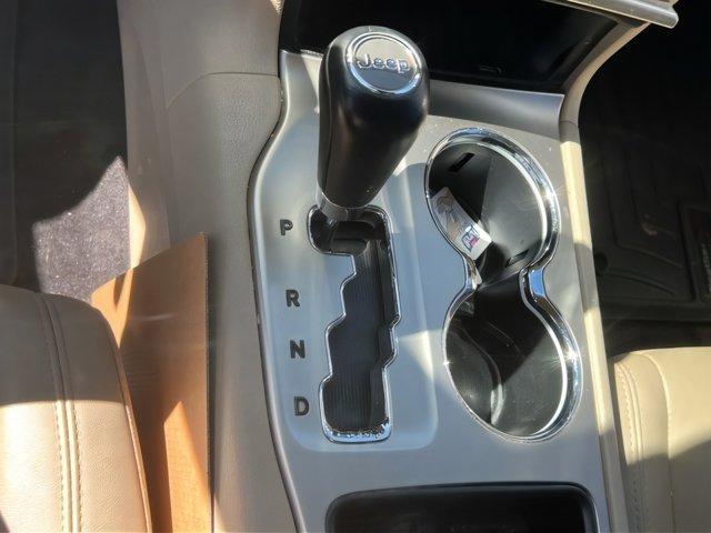Photo of 2011 White Gold Jeep Grand Cherokee