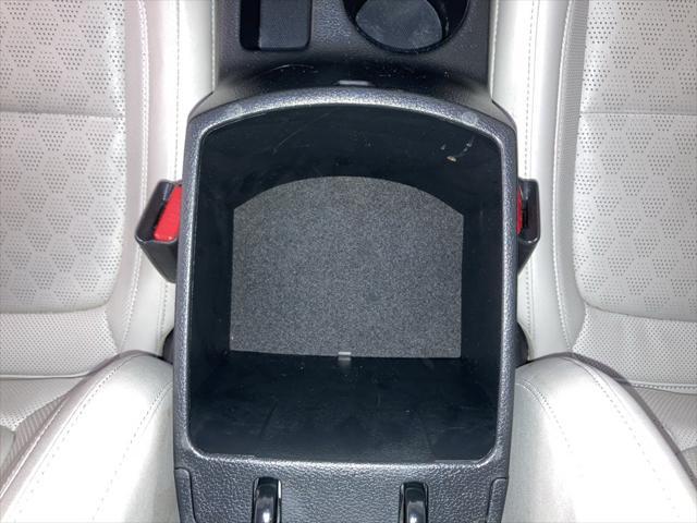 Photo of 2022 Starbright Yellow/Black Roof Kia Seltos