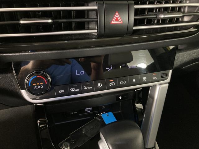 Photo of 2022 Starbright Yellow/Black Roof Kia Seltos