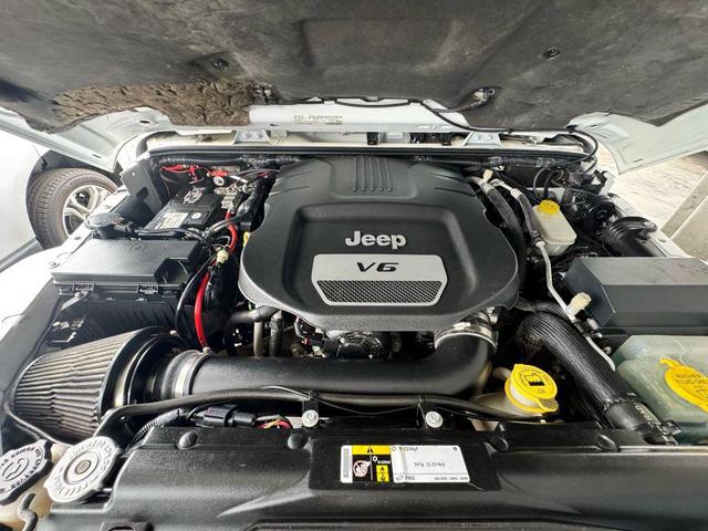 Photo of 2015 Bright White Clearcoat Jeep Wrangler