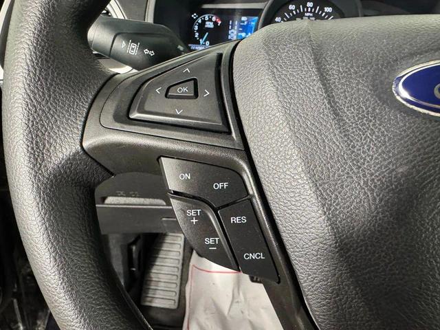 Photo of 2024 Agate Black Metallic Ford Edge