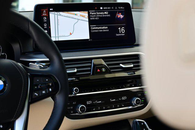 Photo of 2023 Black Sapphire Metallic BMW 530e