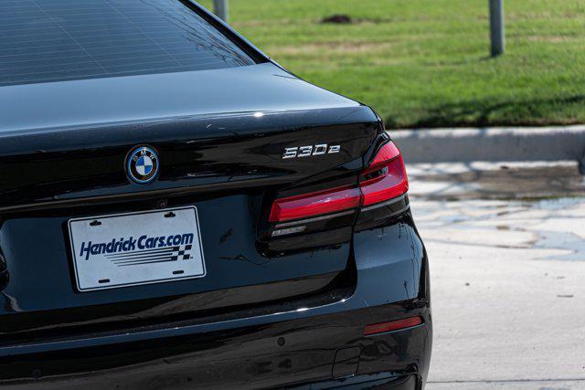 Photo of 2023 Black Sapphire Metallic BMW 530e