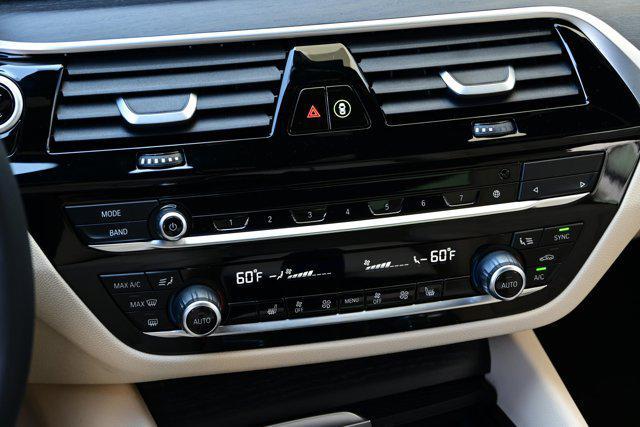 Photo of 2023 Black Sapphire Metallic BMW 530e