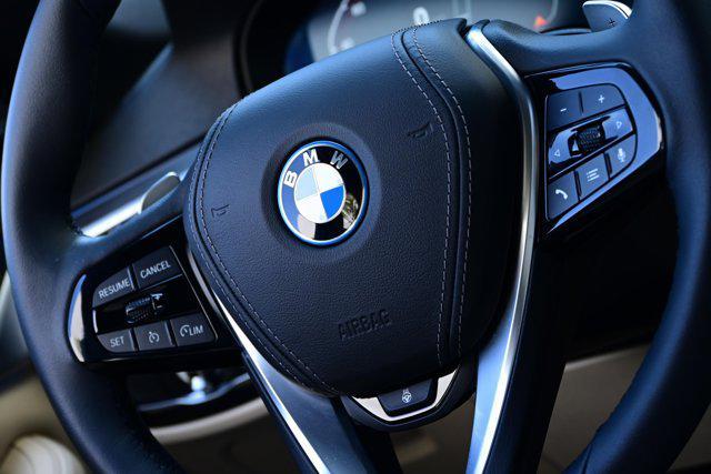 Photo of 2023 Black Sapphire Metallic BMW 530e